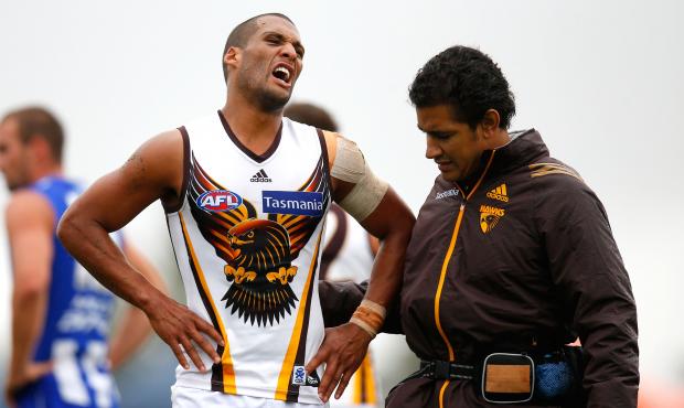 AFL 2013 NAB Cup Rd 04 - North Melbourne v Hawthorn Josh Gibson of the Hawks receives medical treatment during the 2013 NAB Cup round 04 match between the North Melbourne Kangaroos and the Hawthorn Hawks at Highgate Recreational Reserve, Craigieburn. (Photo: Michael Willson/AFL Media)